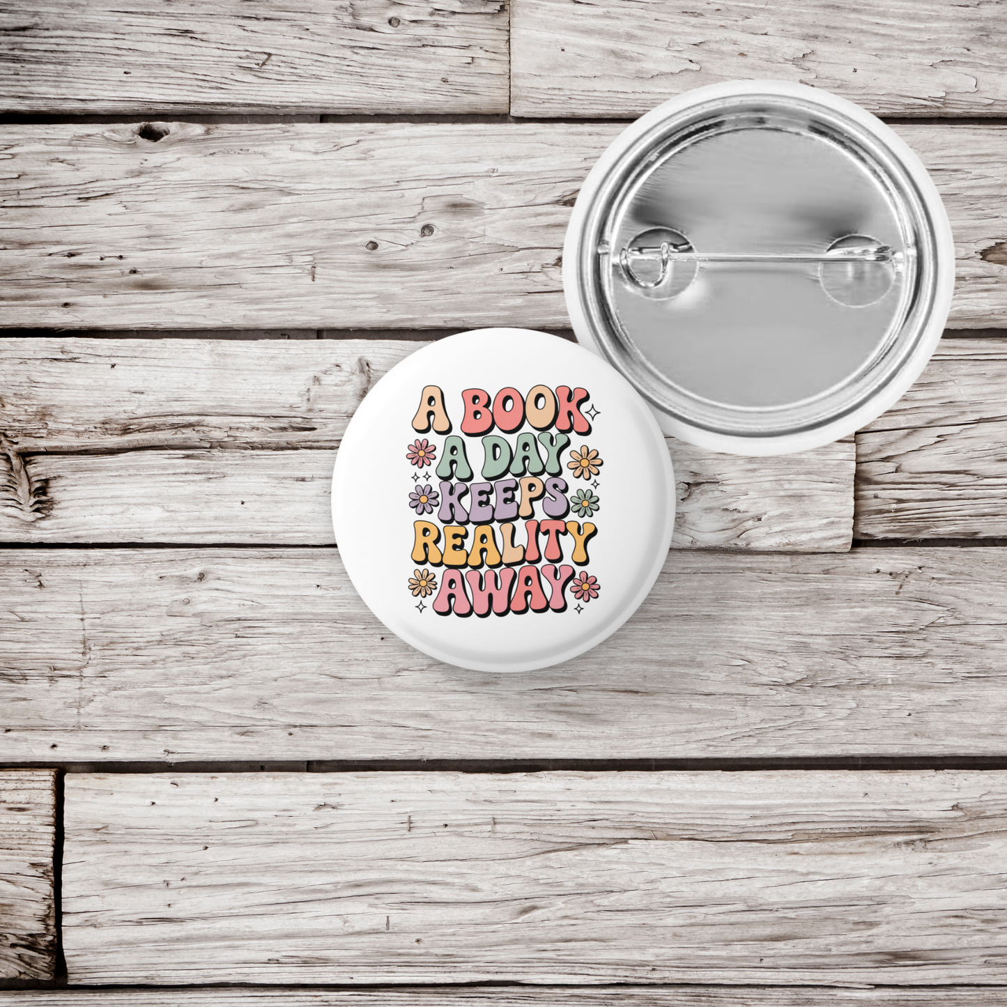 A Book A Day Keeps Reality Away Pin Back Button, Magnet
