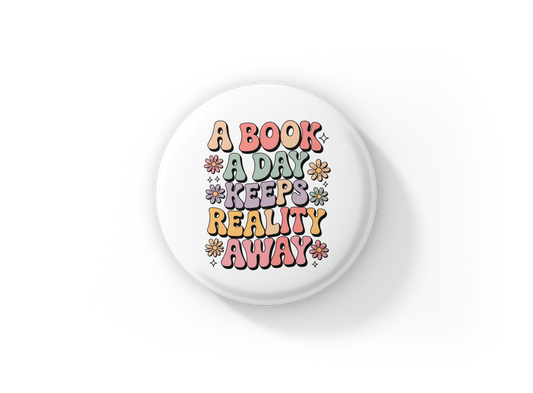 A Book A Day Keeps Reality Away Pin Back Button, Magnet